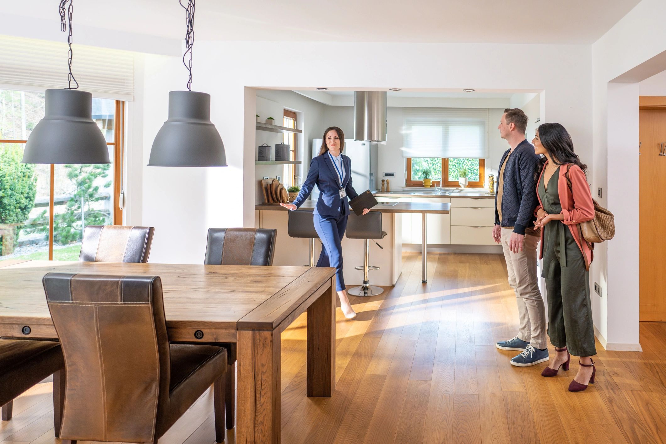 Homeowners reviewing a renovated home interior